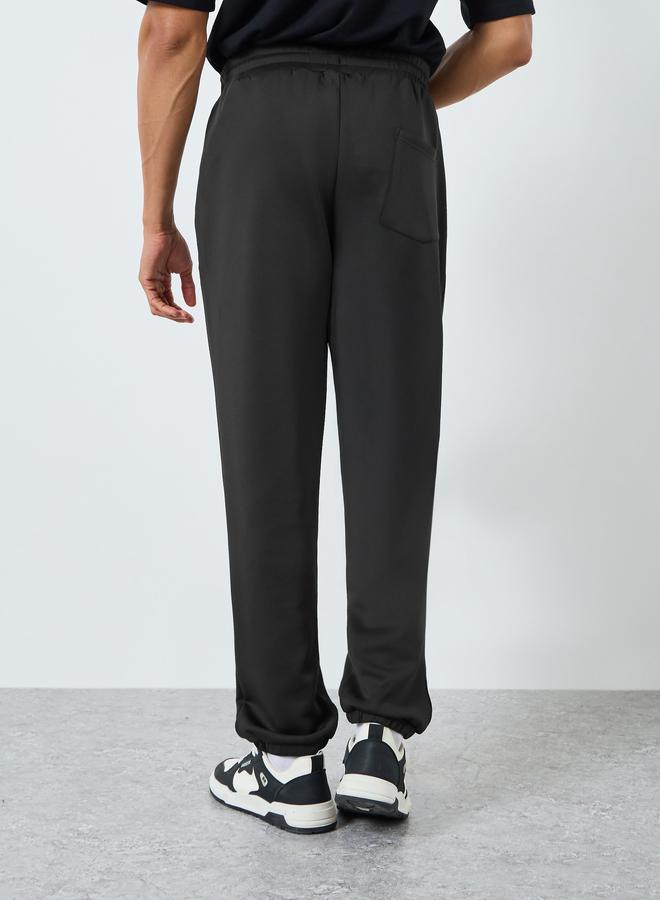 Styli Men Black Oversized Paneled Patch Scuba Joggers - Image 4